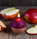 Bougie rouge et or « Pomme ambrée »