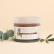 Savon noir Aroma-Zone avec feuilles sur fond beige