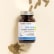 Complément alimentaire Iode Marin Aroma-Zone sur fond beige avec des gélules et de la poudre