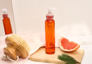 Olio per massaggio pelle a buccia d'arancia Pompelmo & Cedro