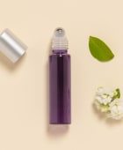 Flacone roll-on in vetro viola e sfera in acciaio 15 ml