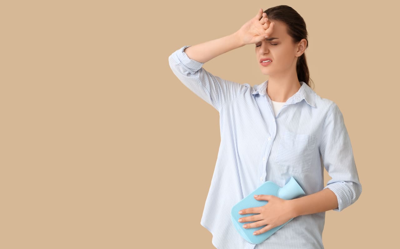 J'ai mal aux ovaires sans avoir mes règles : que faire ?