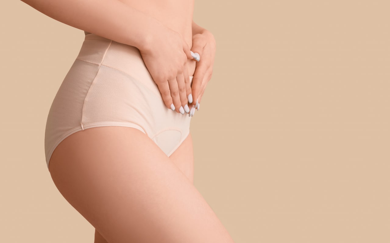Lower abdominal pain but no period: what are the possible causes?