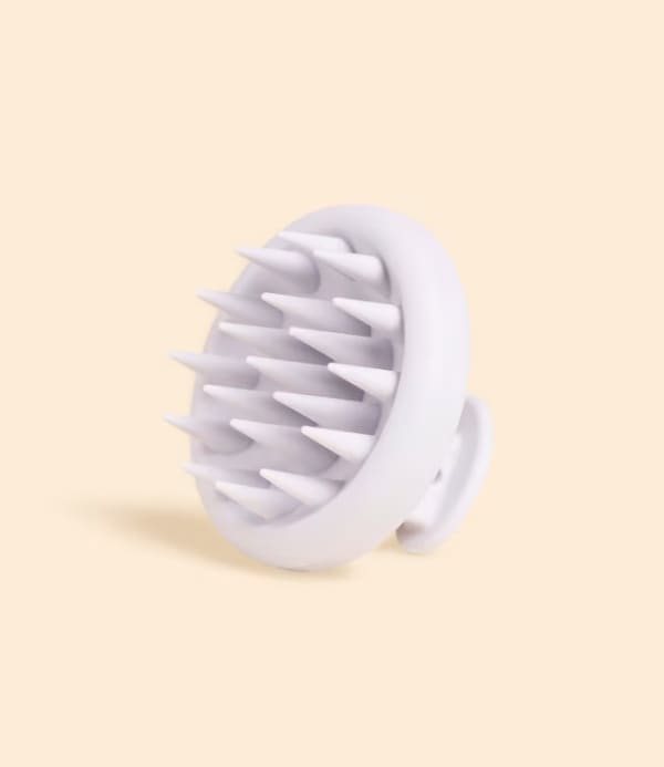 Brosse massante cuir chevelu